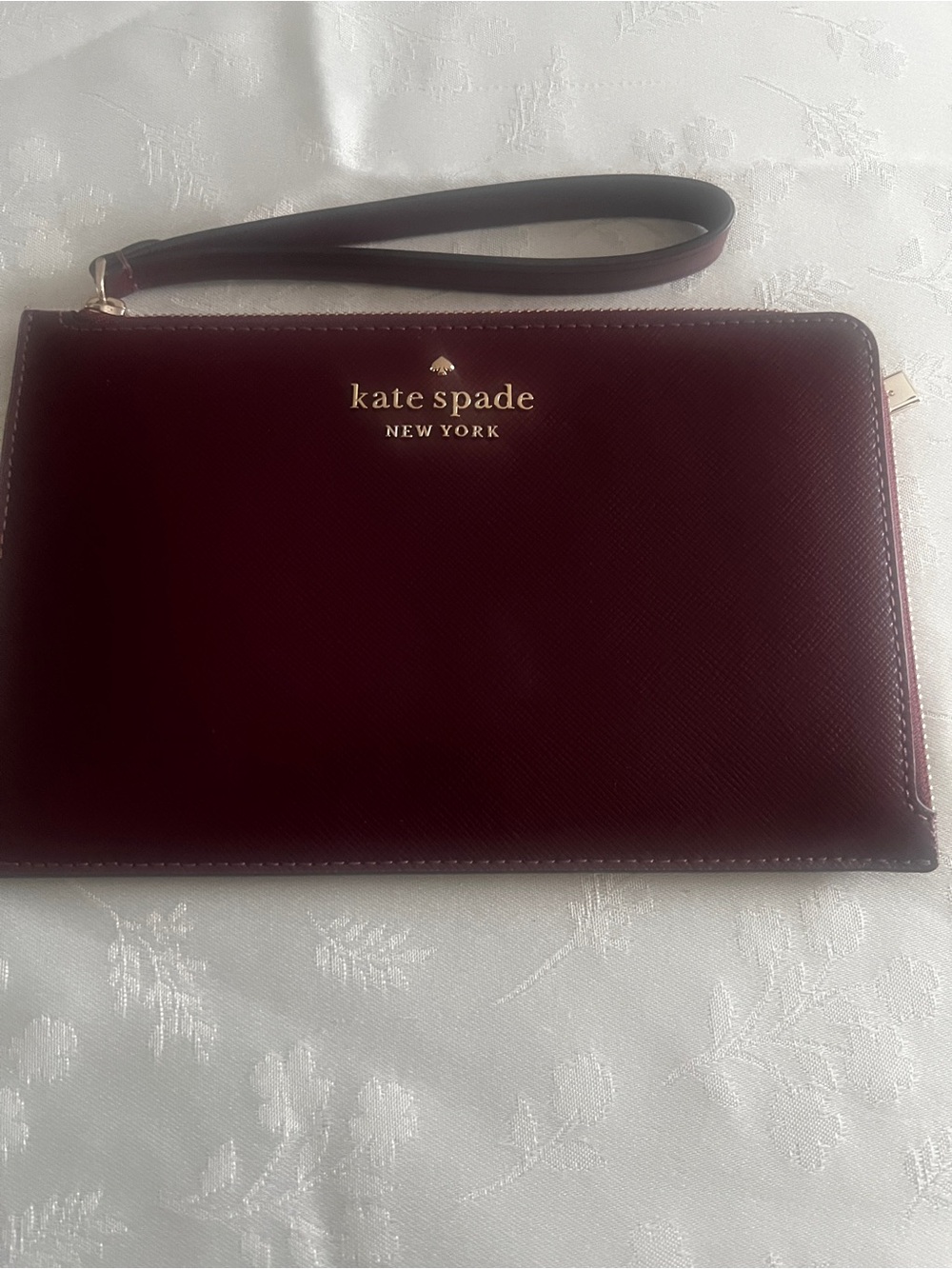 kate spade New York Deep Wine Leather Wristlet